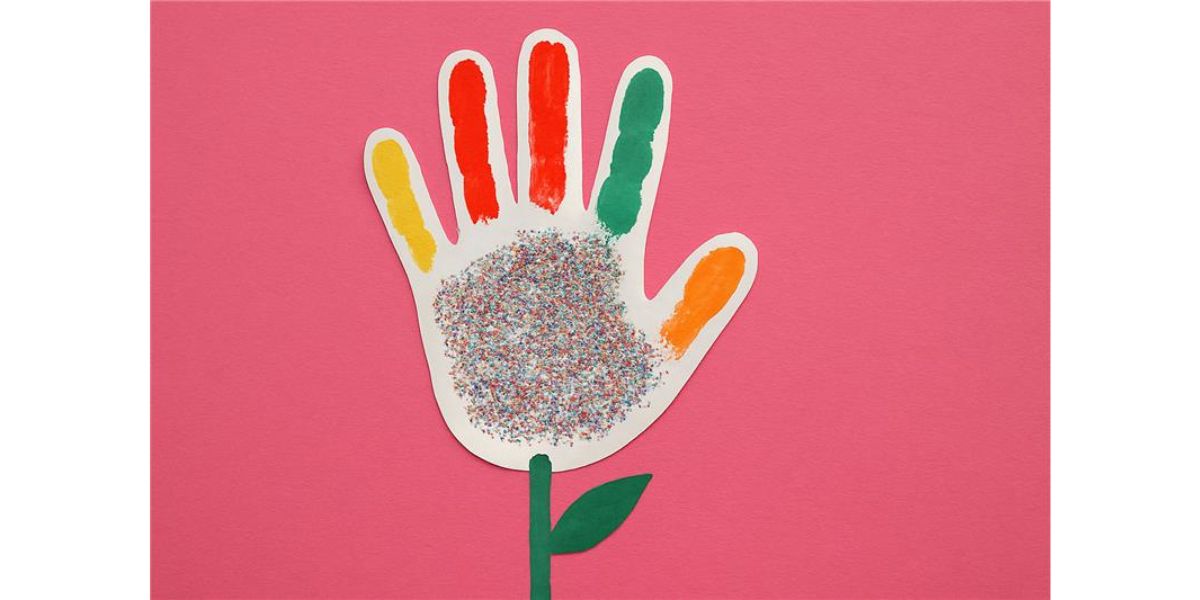 Handprint Mother's Day card with paint and glitter